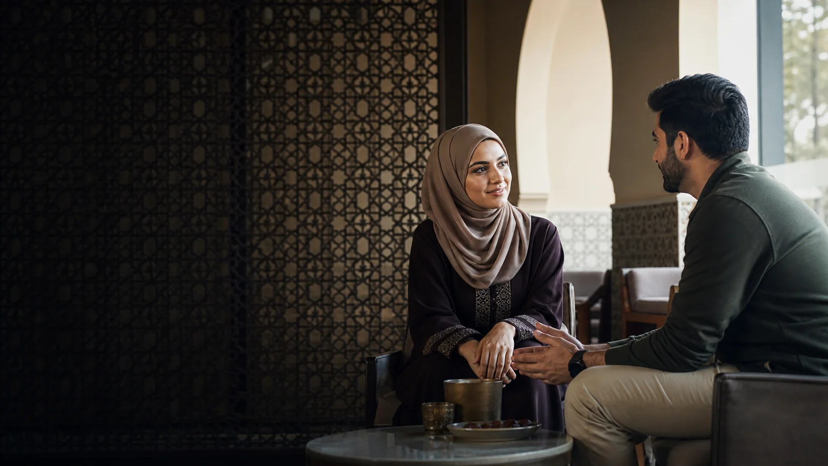 Adults gathering in a welcoming Arab Muslim community setting